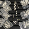 DIN3  Gilt hollow pearl butterfly necklace  Jewelry
